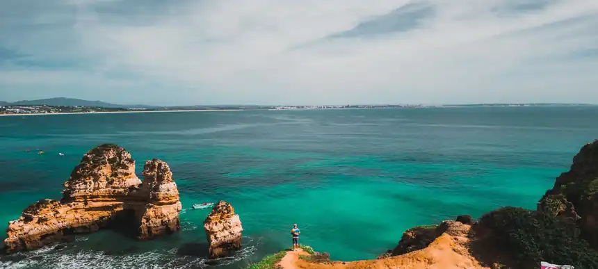 Golden cliffs and turquoise water on the Algarve coast