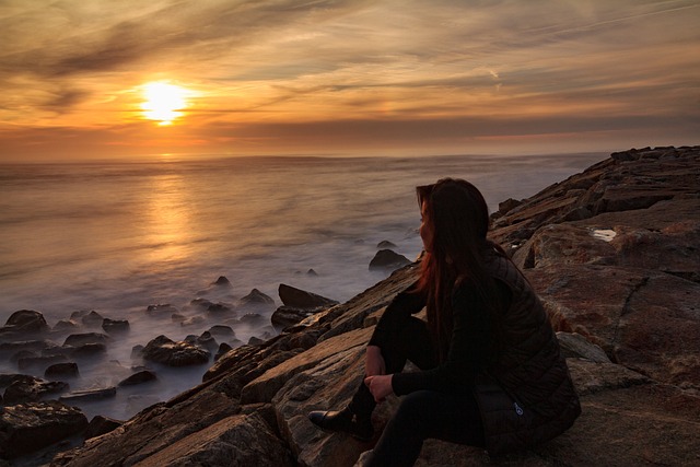 Digital nomad looking at Portugal sunset